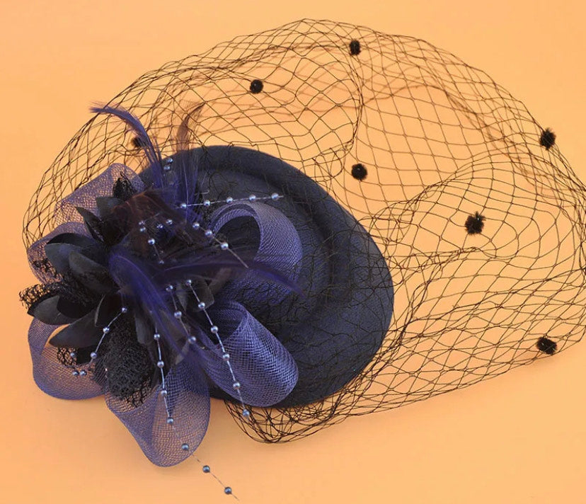 Women fascinator hats.